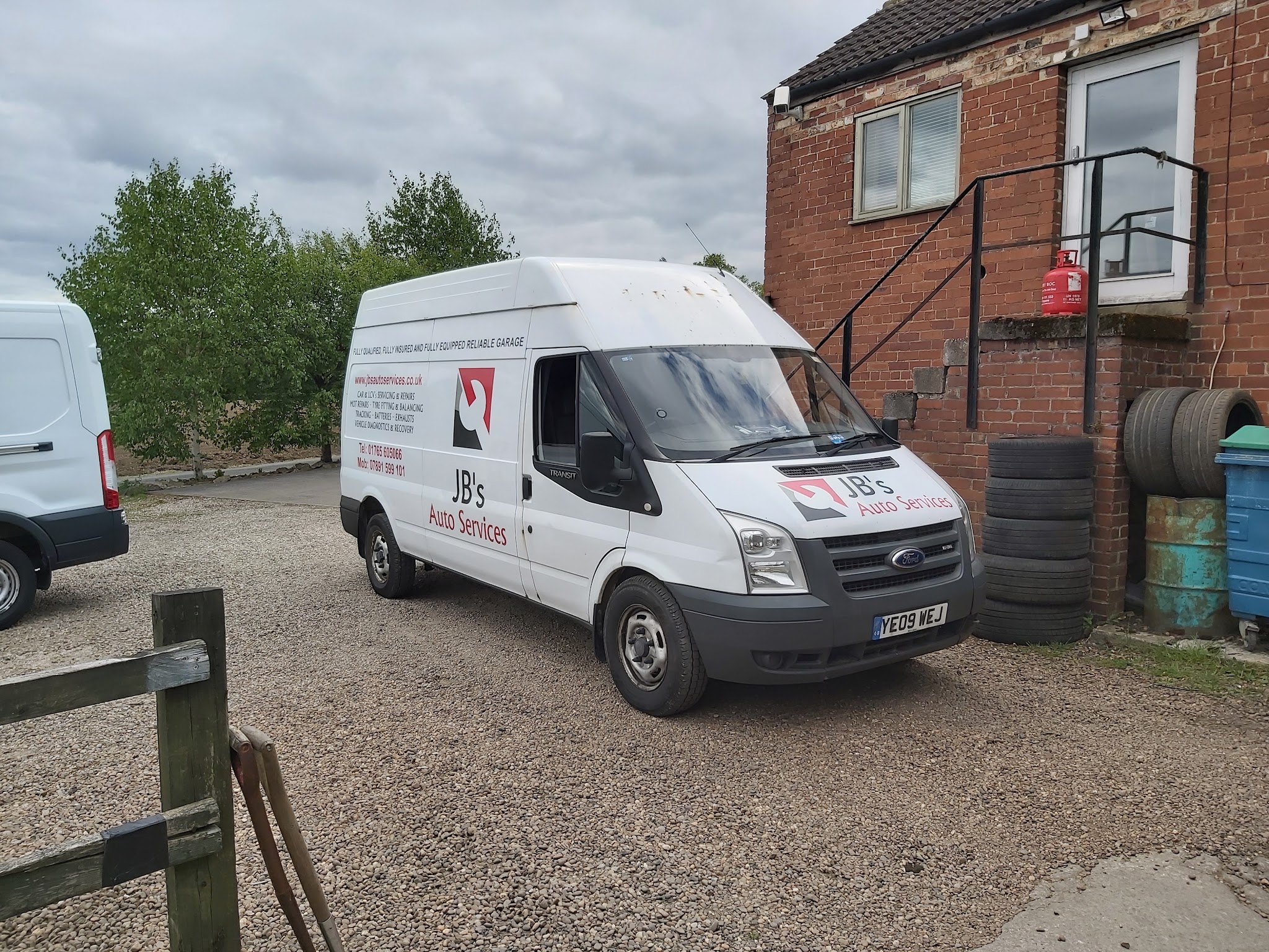 The JB’s Auto Services van parked outside the workshop